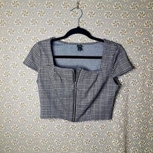 Black and white structured crop top with silver hardware